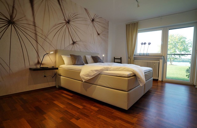Appartement de 150 m² sur Diersfordter Waldsee avec plage de sable et terrasse d'eau
