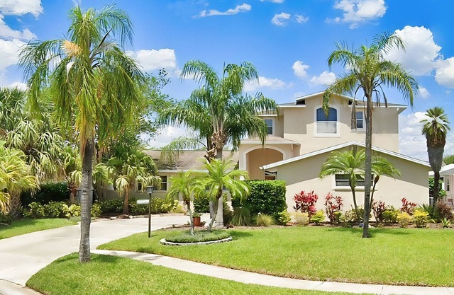 2,657-sq-ft upscale canal home with pool, dock & stunning main suite - dog-friendly