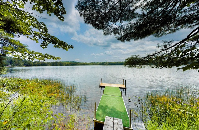 2 beautifully designed, off-the-grid homes with amazing lakefront views & access