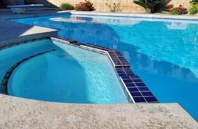 2 bedroom 1 bath private home with a Pool