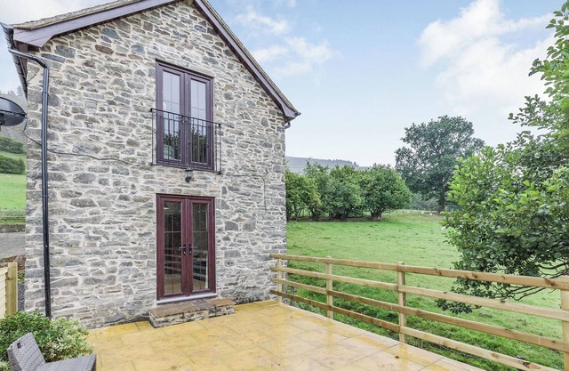 Chic and contemporary barn conversion for four, in a secluded spot in the Welsh countryside.