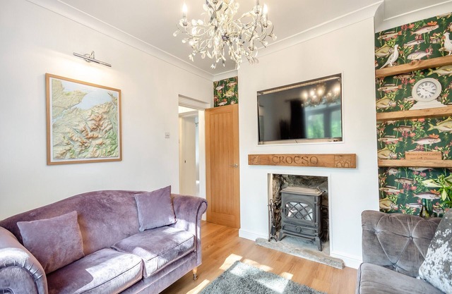 A detached cottage situated in a secluded quiet spot, with river views and next to the Golf Club.