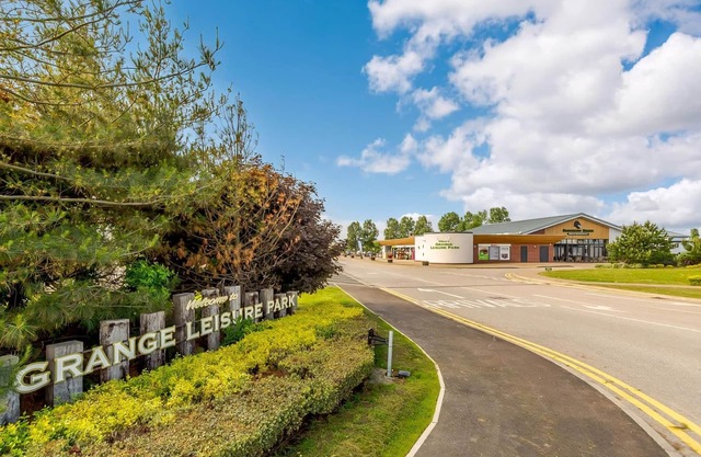 12ft-wide caravan with two twin rooms, and additional sleeping for two in the lounge area.