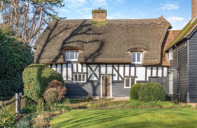 Beautiful thatched cottage with a wealth of beams and character with lovely garden.