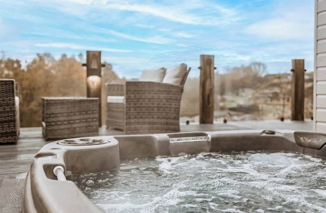 A luxury two-bedroom lodge with a modern lounge layout, perfect for families and couples.