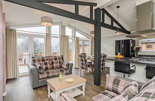 Spacious and contemporary lodge with one double with stylish en suite shower and one twin.