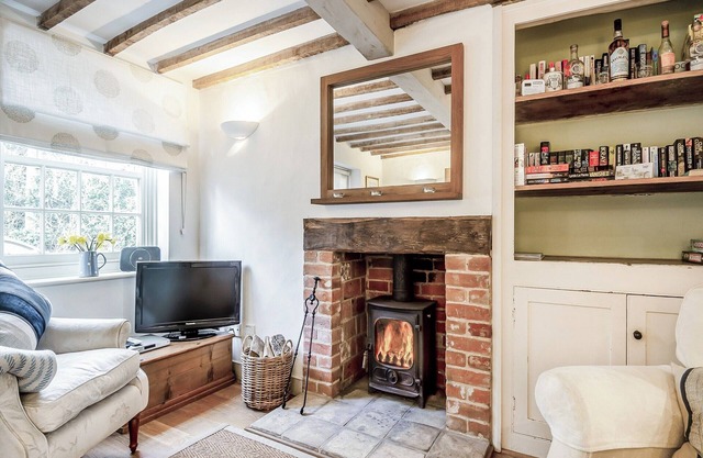 A beautiful, quaint, English cottage with a cosy wood burner and set opposite the church.