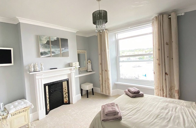 Riverdene is a two bedroom cottage in the heart of Kingswear sleeping up to four guests.