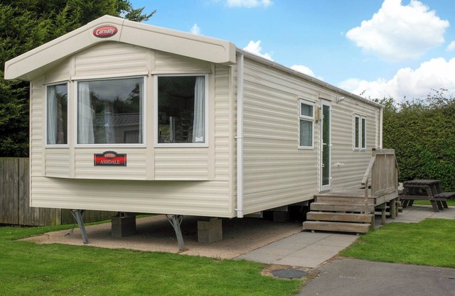 Very comfortable modern and contemporary 12ft-wide caravan with one double and one twin.