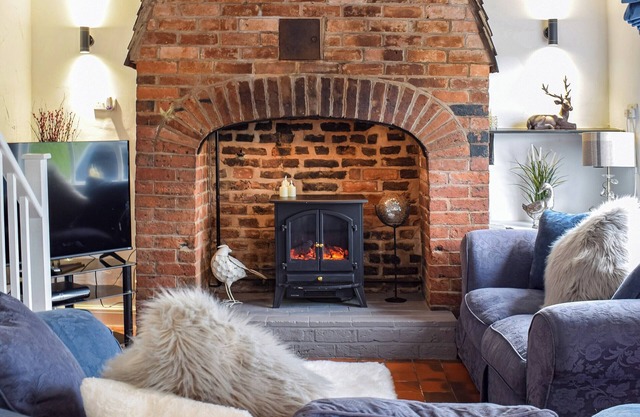 Historic riverside cottage perfect for couples or small families, and pet-friendly too.