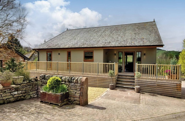 A attractive and spacious Lodge with the River Eamont running beside it.