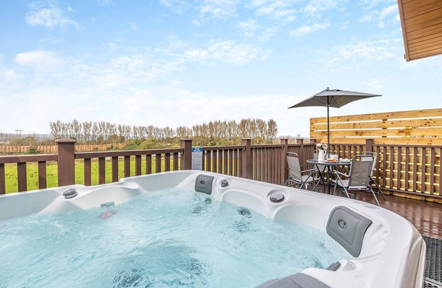 Escape to Billy Goat Lodge, with scenic views, hot tub, and ample space, a perfect combination.
