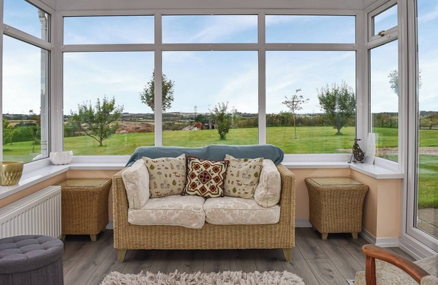 Set within peaceful countryside with lovely gardens and views across to the sea.