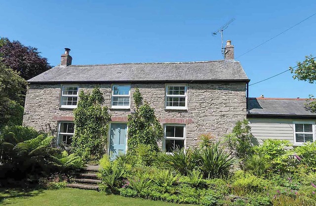 This beautiful two bedroom detached cottage with private enclosed garden is an oasis of calm.