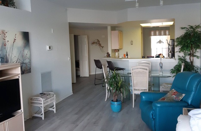 2 bedroom + den, 2 bath first floor condo in Spanish Wells golf community.