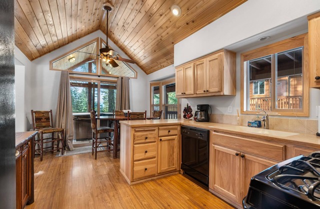 2 cabins with 4 bedrooms, hot tubs, dining room and full kitchen.