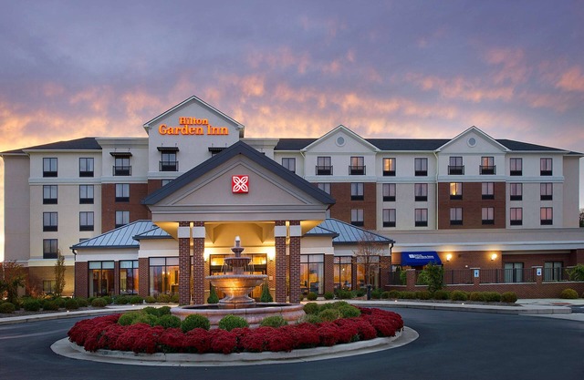 2 Connecting Suites with Two Beds and One Sofabed at a Full Service Hotel by Suiteness