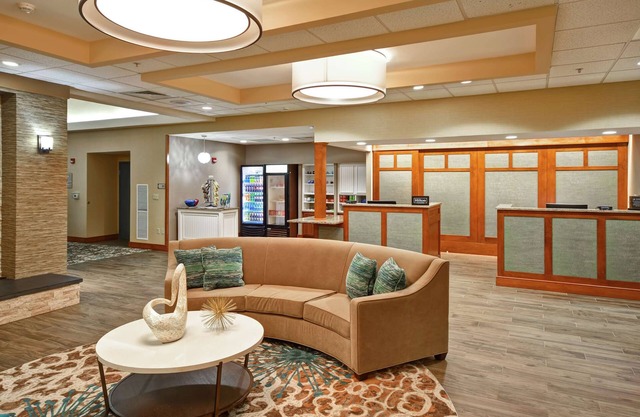 2 Connecting Suites with Three Beds and Two Sofabeds at a Full Service Hotel by Suiteness