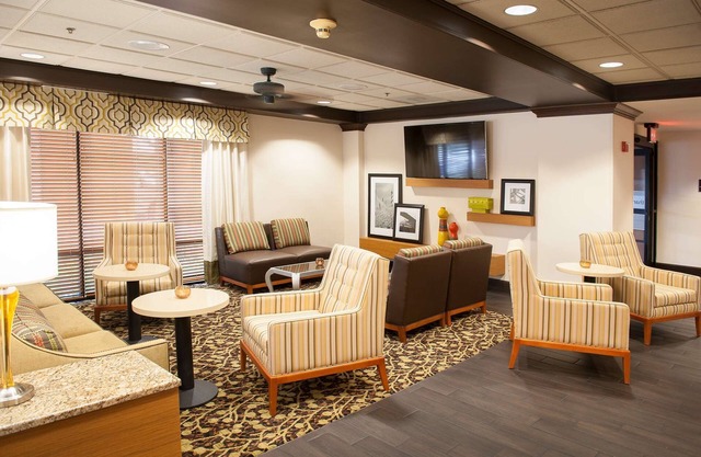 2 Connecting Suites with Two Beds and One Sofabed at a Full Service Hotel by Suiteness