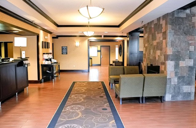 2 Connecting Suites with Two Beds and Two Sofabeds at a Full Service Hotel by Suiteness
