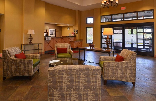 2 Connecting Suites with Two Beds and Two Sofabeds at a Full Service Hotel by Suiteness