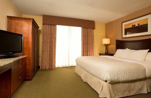 2 Connecting Suites with Two Beds and Two Sofabeds at a Full Service Hotel by Suiteness