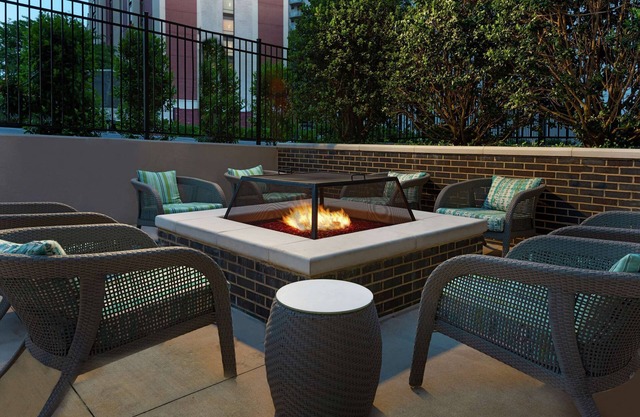 2 Connecting Suites with 4 Beds and One Sofabed at a Full Service Hotel by Suiteness