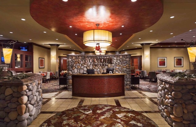 2 Connecting Suites with Three Beds and Two Sofabeds at a Full Service Hotel by Suiteness
