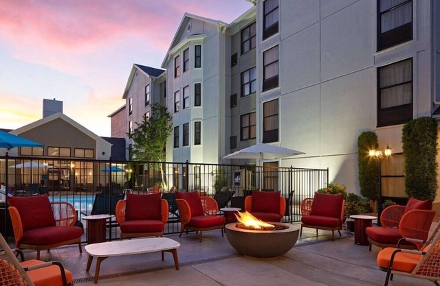 2 Connecting Suites with Three Beds and One Sofabed at a Full Service Hotel by Suiteness