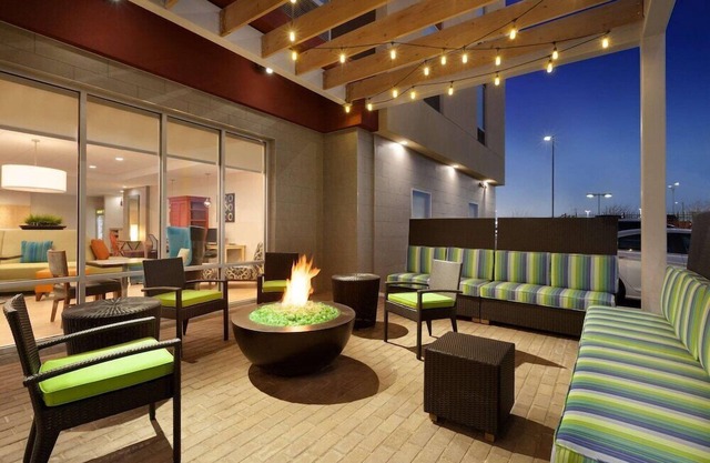 2 Connecting Suites with Three Beds and Two Sofabeds at a Full Service Hotel by Suiteness