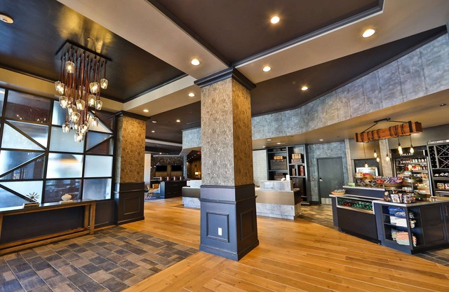 2 Connecting Suites with Two Beds and One Sofabed at a Full Service Hotel by Suiteness