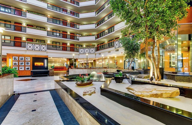 2 Connecting Suites with Two Beds and Two Sofabeds at a Full Service Hotel by Suiteness