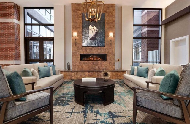 2 Connecting Suites with 4 Beds and Two Sofabeds at a Full Service Hotel by Suiteness