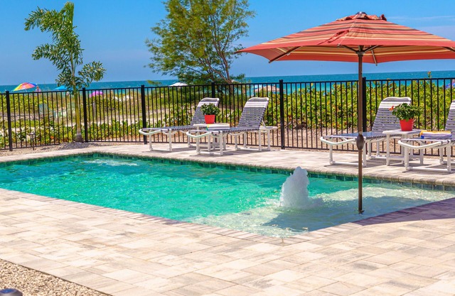 2 PRIVATE BEACH HOMES REMODELED W/ HEATED POOL