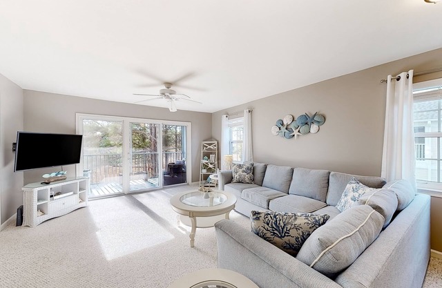 2nd-floor condo at Bethany Bay with pool, on-site golf, and sports courts