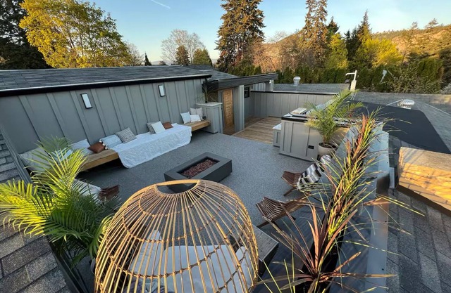 3 bdrm suite w/rooftop patio, firetable & sauna + hot tub, cold plunge, gym.