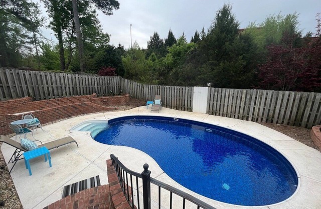 3 bedroom, 2.5 bathroom patio home with an inground pool