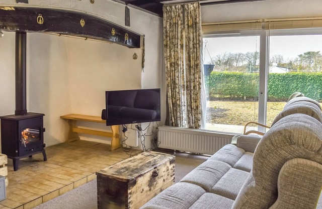 A detached bungalow with large garden, ideal for families and outdoor enthusiasts.