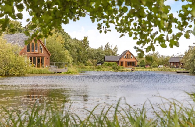 Commanding a fantastic position at the head of the three lakes with its own private jetty.