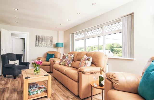 A gorgeous bungalow standing detached in the heart of Cribyn with its own private hot tub.