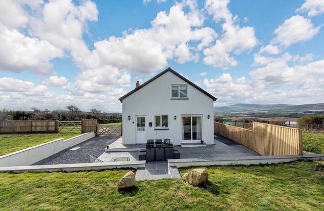 Picked for its amazing views across the Preseli Hills and boasting a private hot tub.