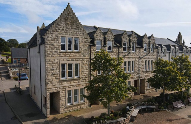 3-bedroom, fully furnished townhouse overlooking the historic Dornoch Square.