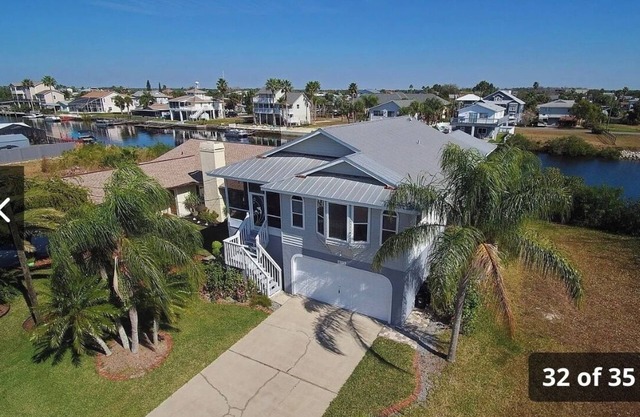3-bedroom waterfront house in lovely Hernando Beach with pool, dock, AC, WiFi