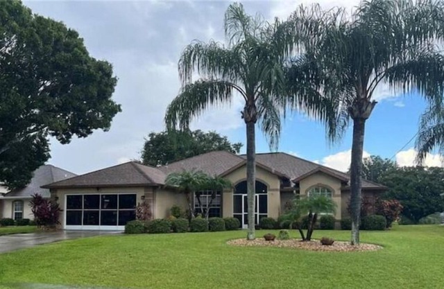 3 beds, 2 bath, Waterfront home in Rotonda West, FL. w/heated pool.