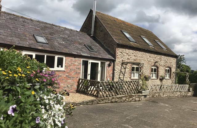 Maison de la conversion de la grange de Harry, lit suite de 3 en- et poêle à bois contemporain, vue