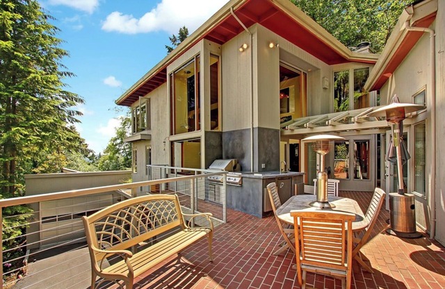 3br urban oasis with lake views, swimming pool, hot tub, steam shower and sauna.