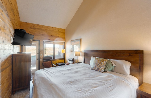 3rd-floor condo with balcony, indoor & outdoor pools, game room, gym, W/D
