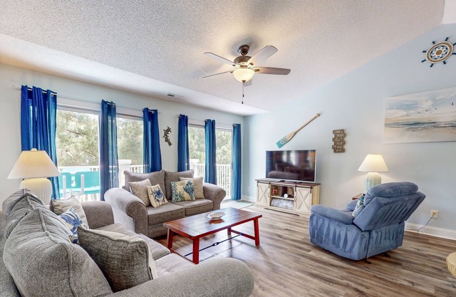 3rd-floor golf course-front condo with inviting deck, beaches & golf nearby