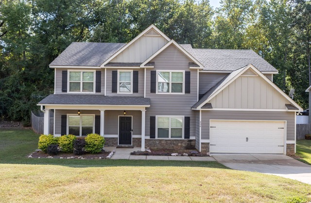 4 bedroom/3 bath home with bonus spaces close to everything you need or want!