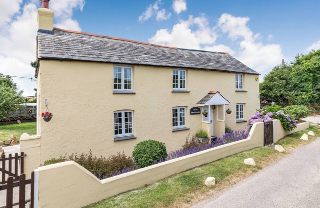 A charming, detached farmhouse with plenty of character.